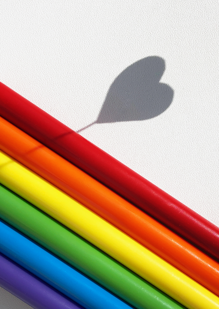 Rainbow markers with heart.